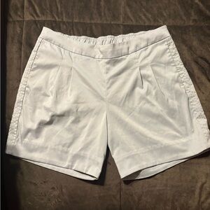 Women’s Nike Golf shorts in light gray, Dri-Fit, snap back pocket